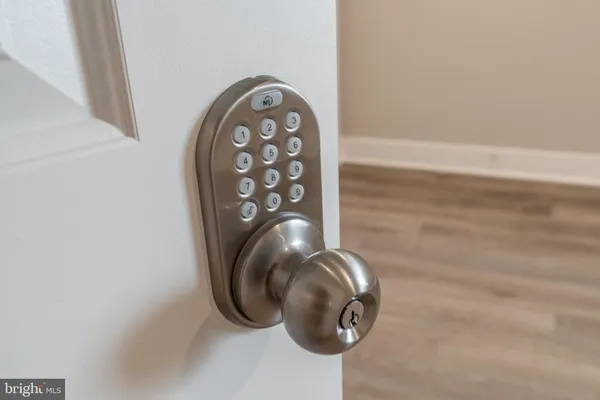 a view of entryway with wooden floor