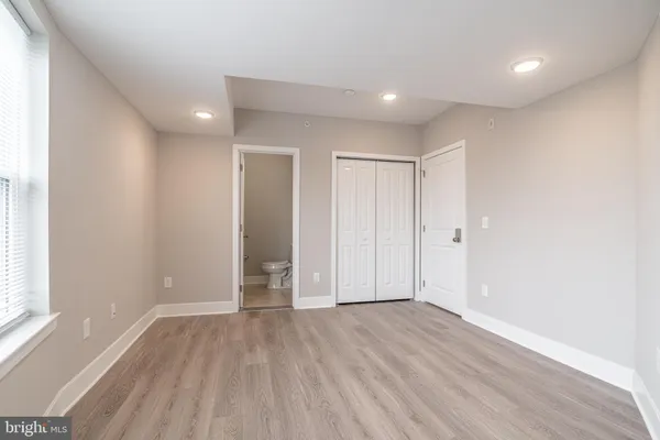 a bathroom with a sink and shower