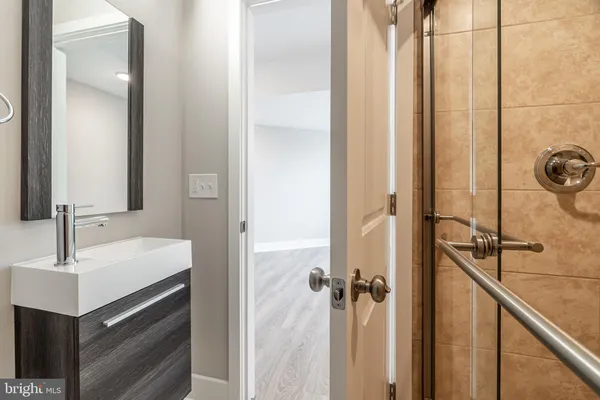 a view of a balcony with two chairs and a table