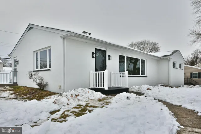 a bed room with a bed and a couch