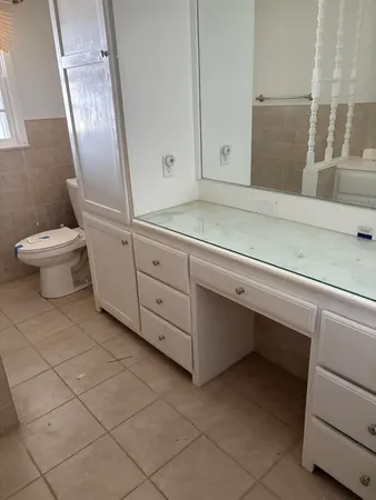 a bathroom with a sink and a toilet