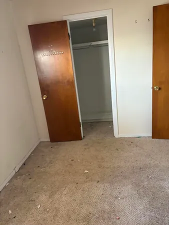 an empty room with closet
