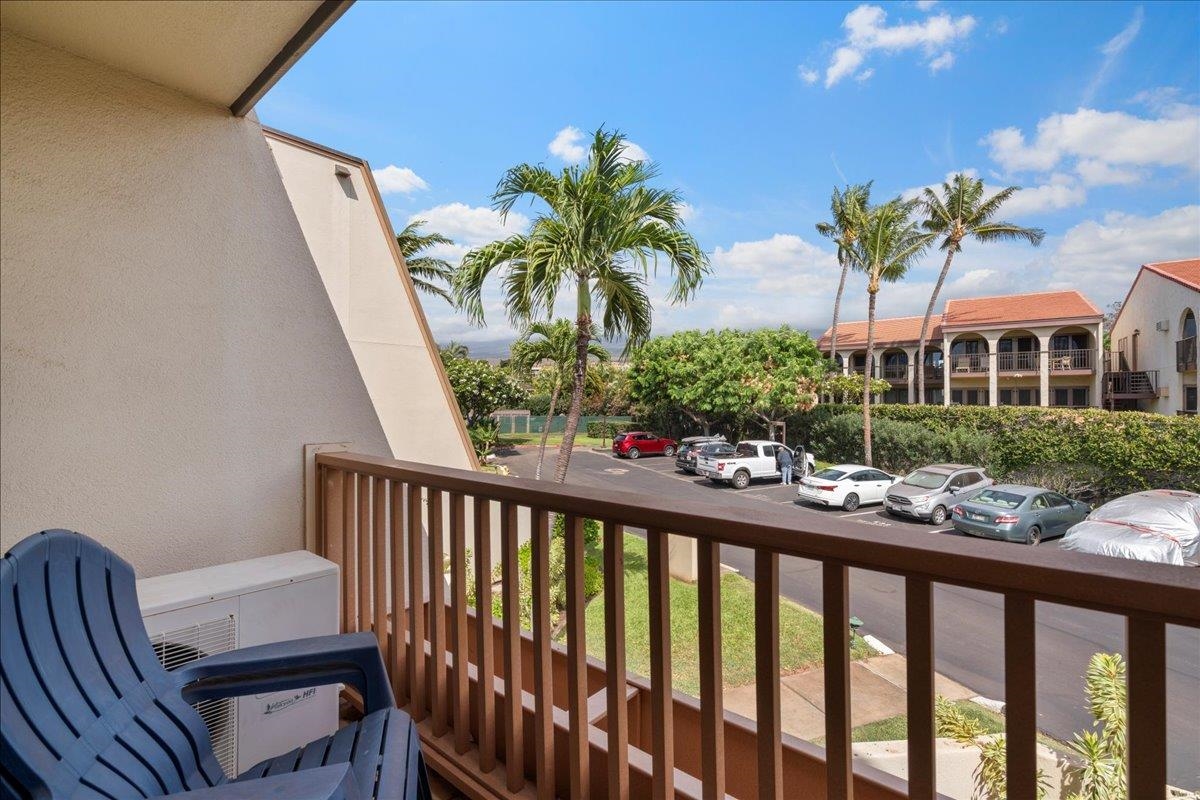 2777 South Kihei Road, Unit F203 Kihei, HI 96753 - Photo 19 of 37 a view of a porch with chairs and potted plants