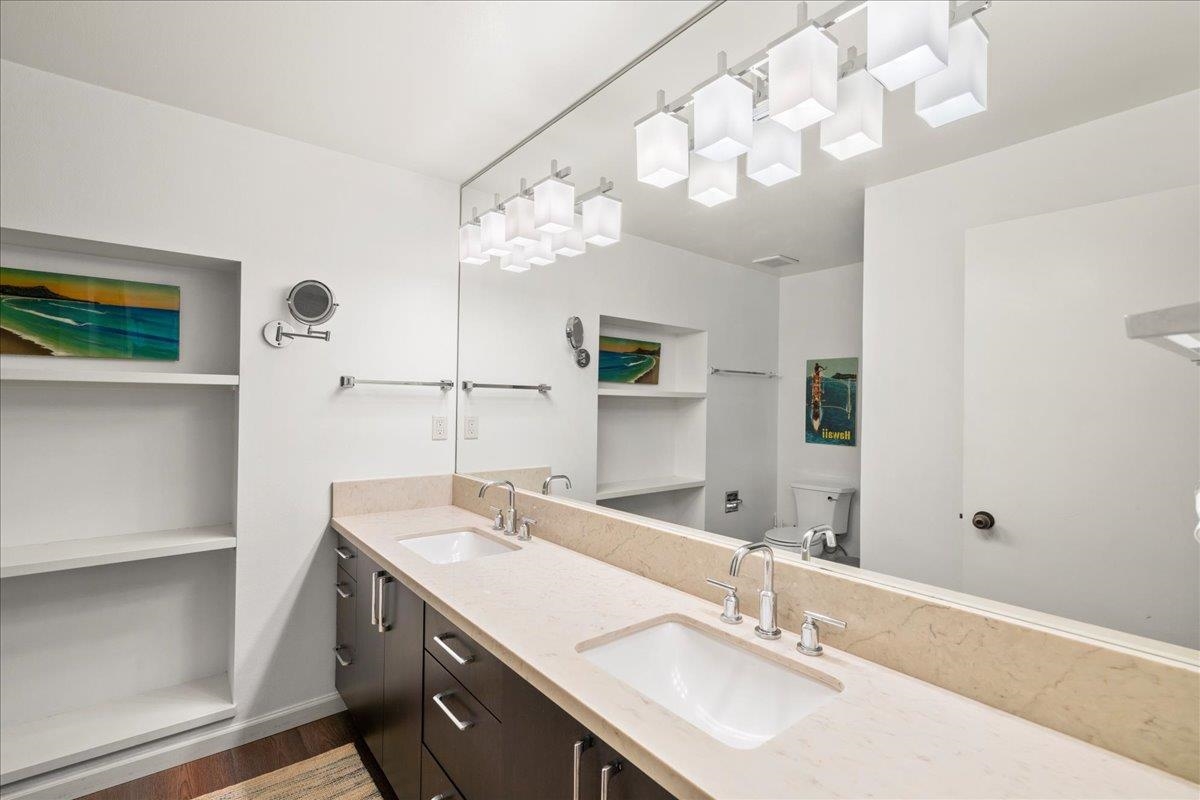 2777 South Kihei Road, Unit F203 Kihei, HI 96753 - Photo 35 of 37 a bathroom with a sink vanity and a mirror