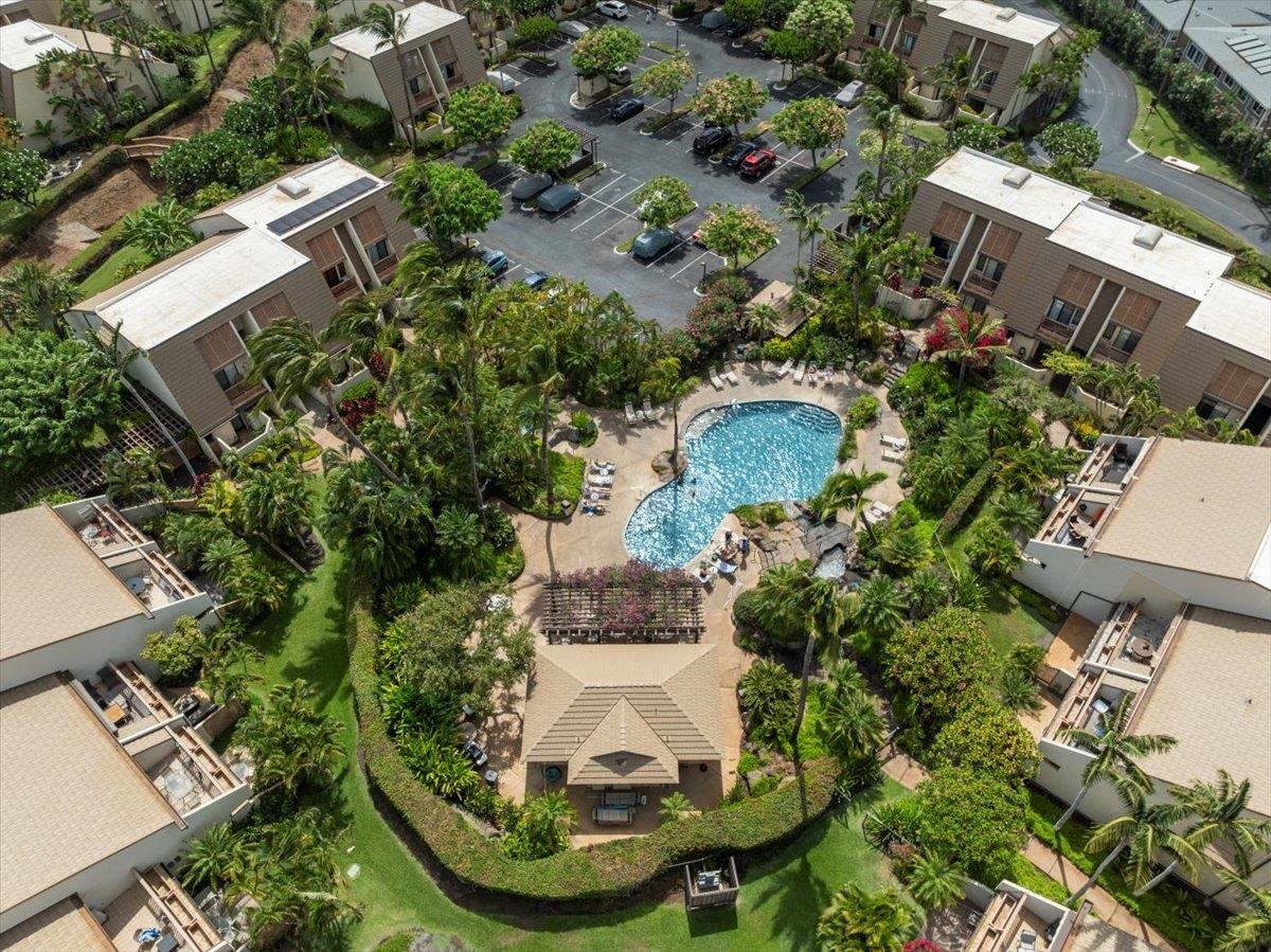 2777 South Kihei Road, Unit F203 Kihei, HI 96753 - Photo 6 of 37 an aerial view of a house with a yard and trees