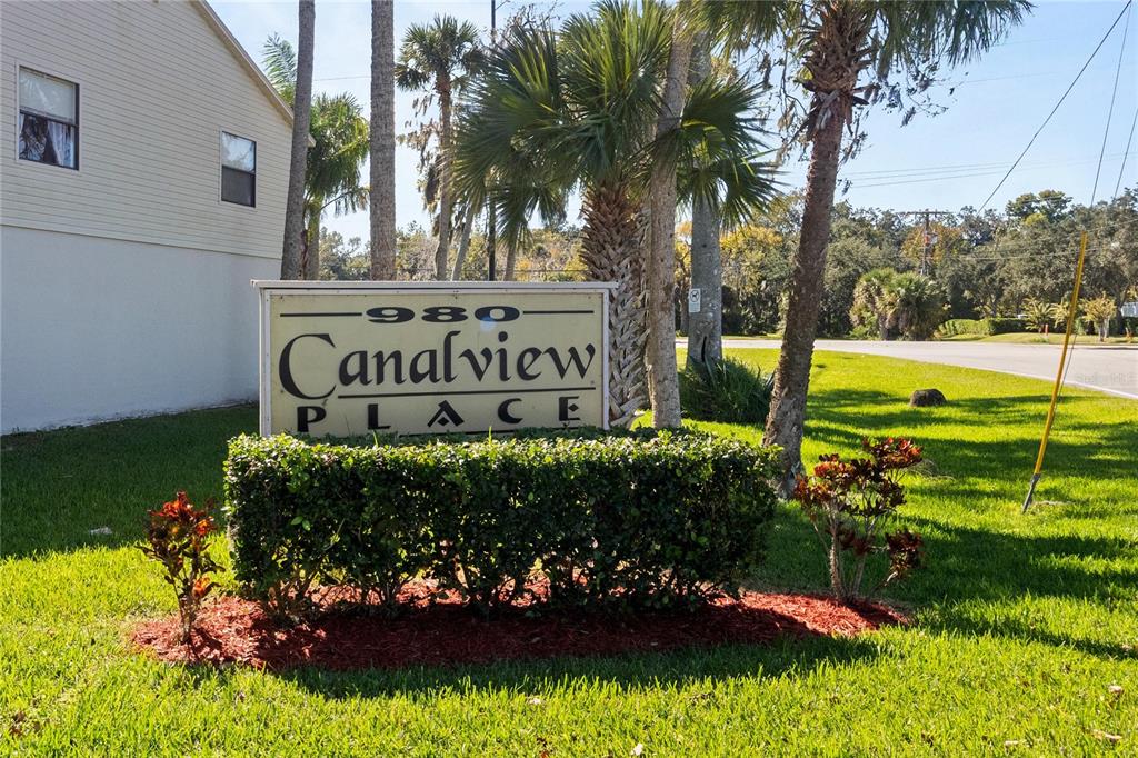 980 Canal View Boulevard, Unit I3 Port Orange, FL 32129 - Photo 17 of 17 a sign on the side of the road