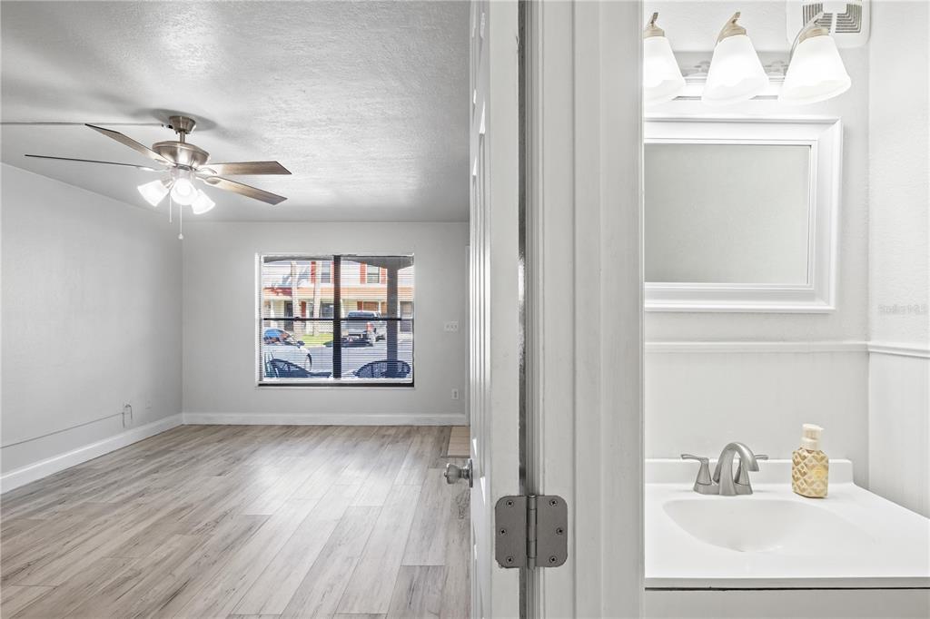 980 Canal View Boulevard, Unit I3 Port Orange, FL 32129 - Photo 5 of 17 a view of an entryway with wooden floor