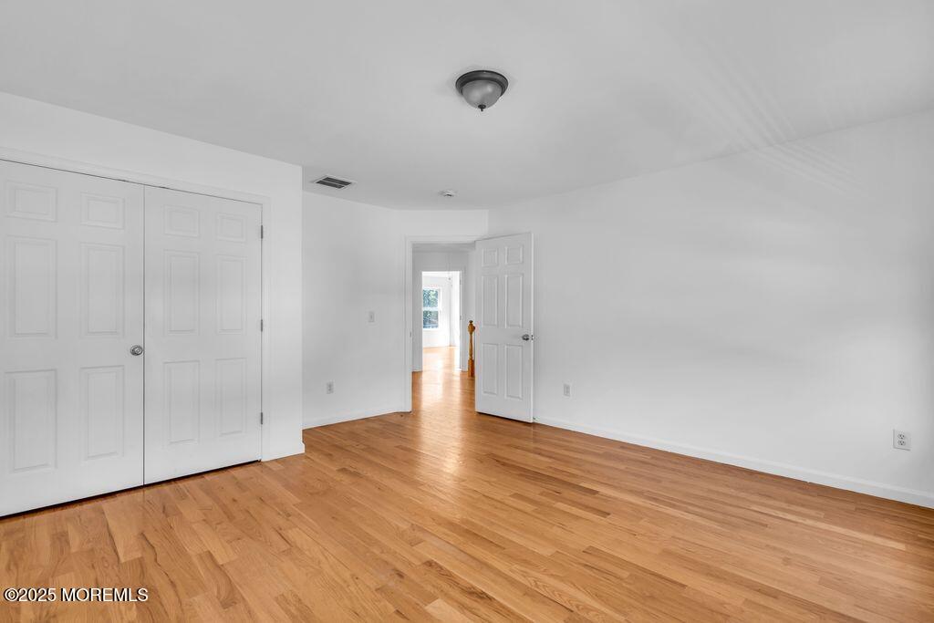 18 Stuyvesant Road Brick, NJ 08723 - Photo 21 of 29 a view of an empty room and wooden floor