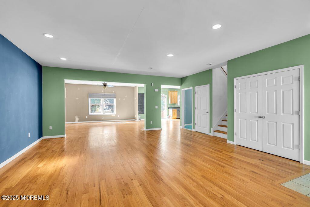 18 Stuyvesant Road Brick, NJ 08723 - Photo 4 of 29 a view of an empty room with wooden floor and a window