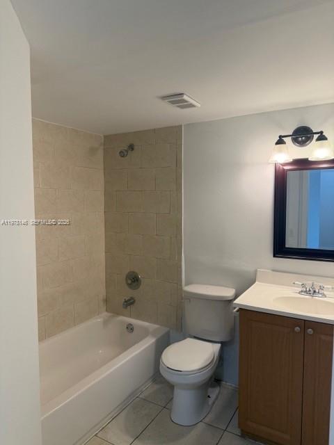 8781 Wiles Road, Unit 103 Coral Springs, FL 33067 - Photo 16 of 19 a bathroom with a bathtub shower sink mirror and toilet