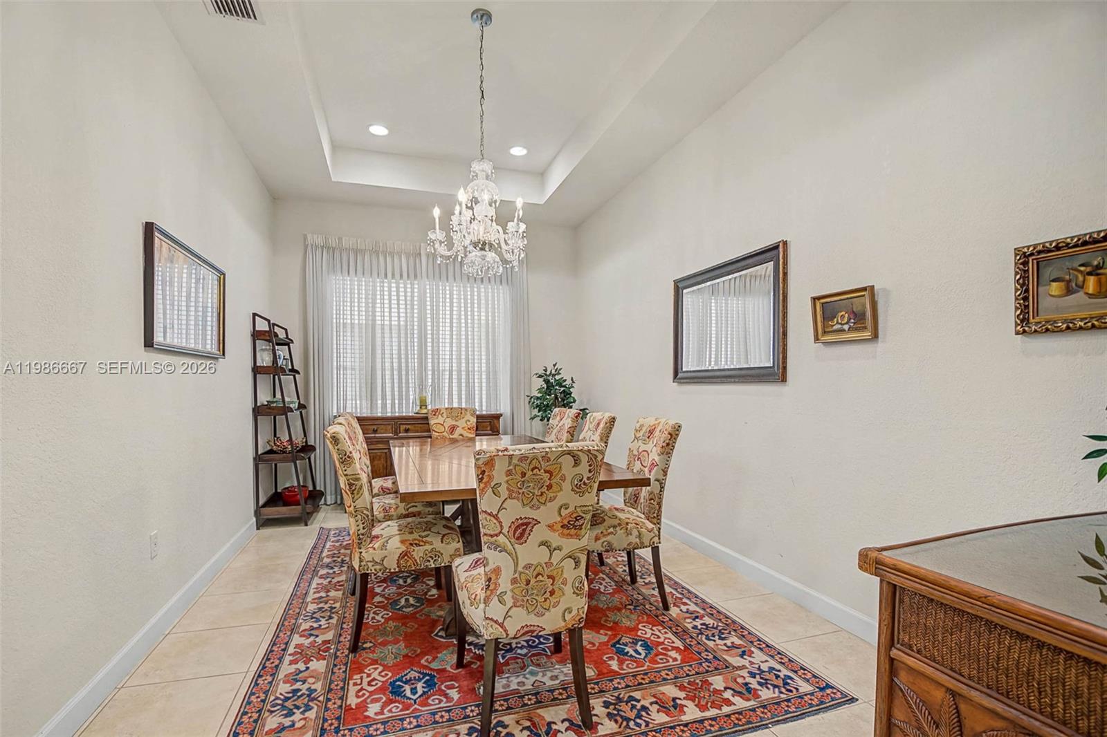 19528 Southwest 79th Place Cutler Bay, FL 33157 - Photo 17 of 41 a view of a dining room with furniture