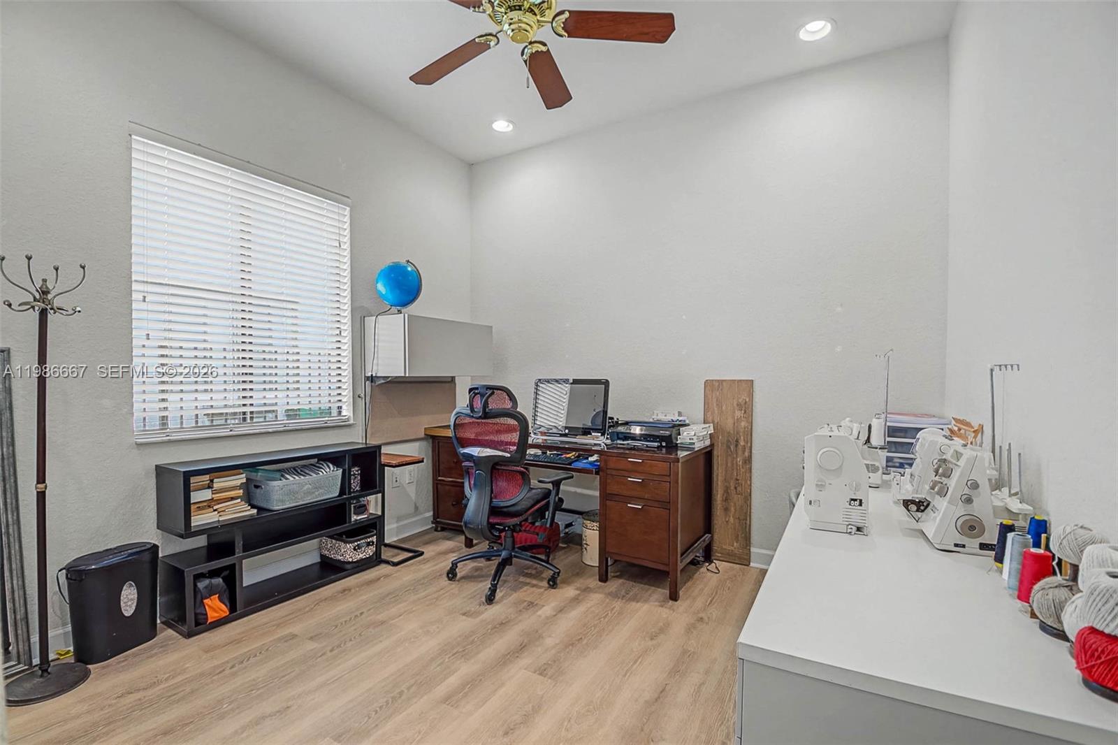 19528 Southwest 79th Place Cutler Bay, FL 33157 - Photo 24 of 41 a workspace with furniture and a window