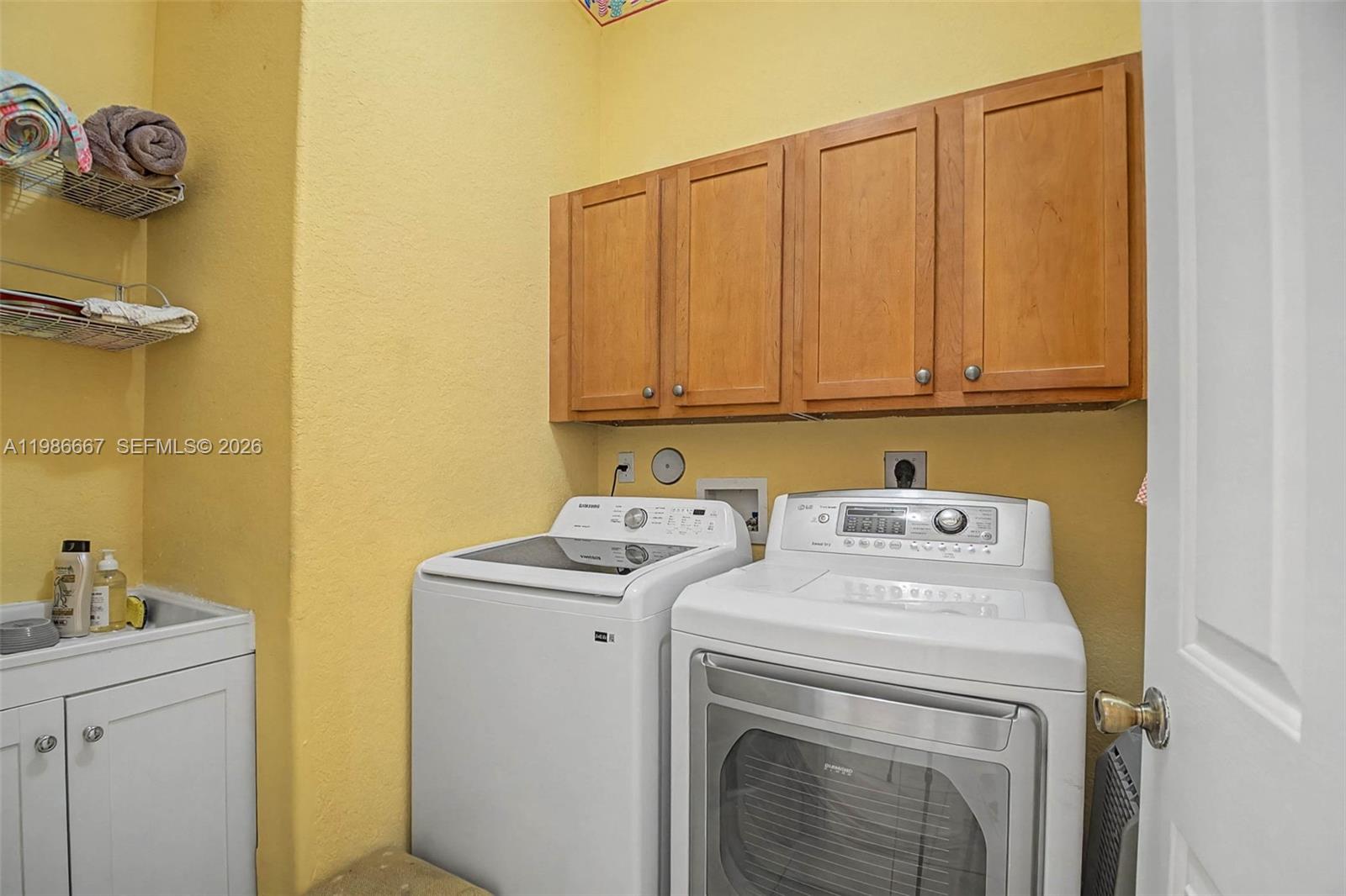 19528 Southwest 79th Place Cutler Bay, FL 33157 - Photo 26 of 41 a utility room with dryer and washer