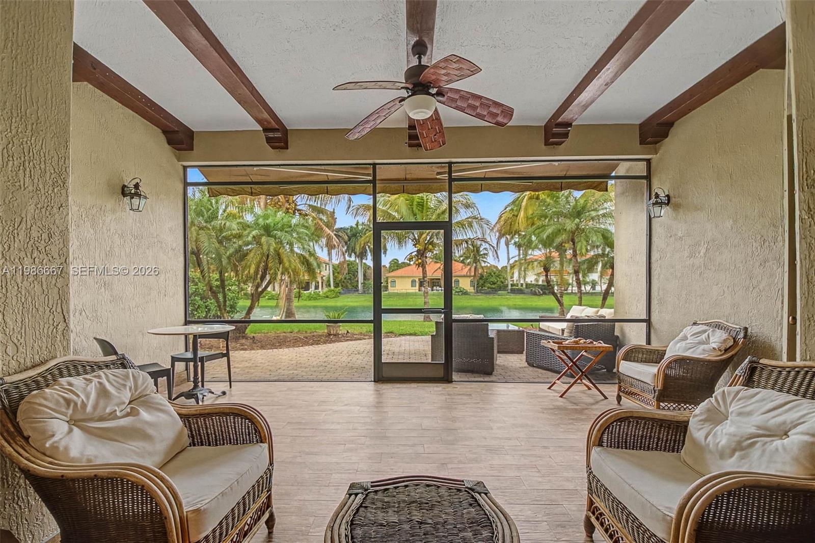 19528 Southwest 79th Place Cutler Bay, FL 33157 - Photo 27 of 41 a living room with furniture and a large window