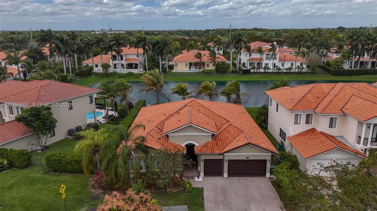 19528 Southwest 79th Place Cutler Bay, FL 33157 - Photo 34 of 41 an aerial view of multiple houses with yard