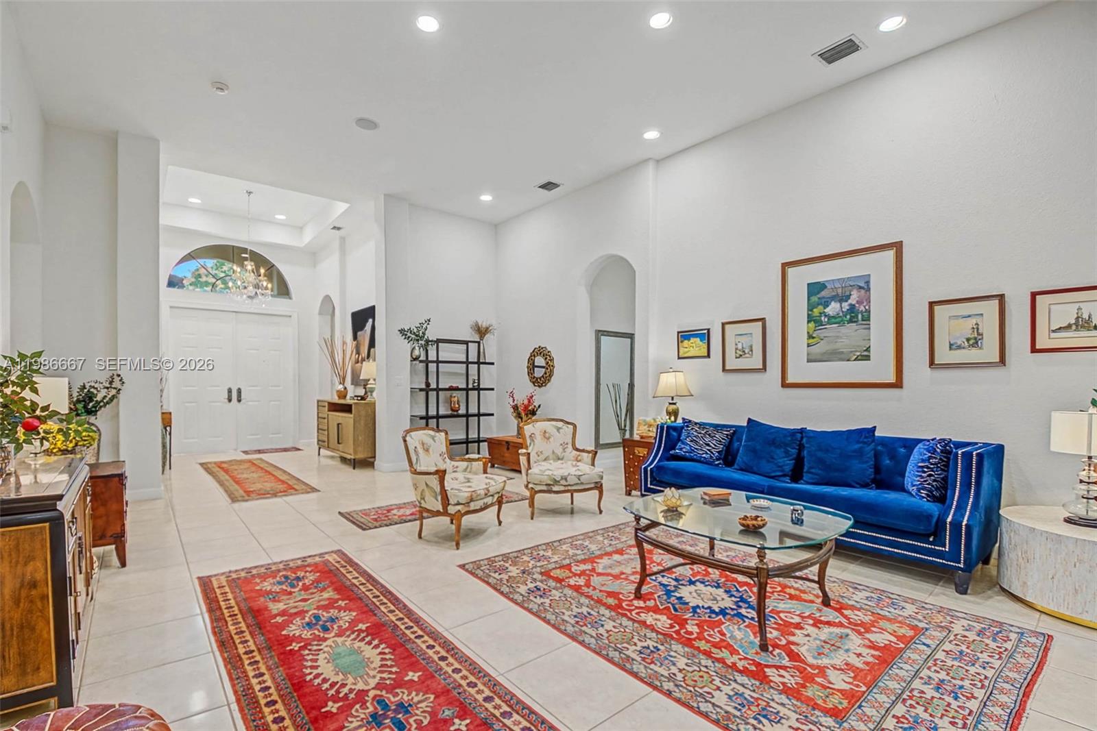 19528 Southwest 79th Place Cutler Bay, FL 33157 - Photo 5 of 41 a living room with furniture and wooden floor