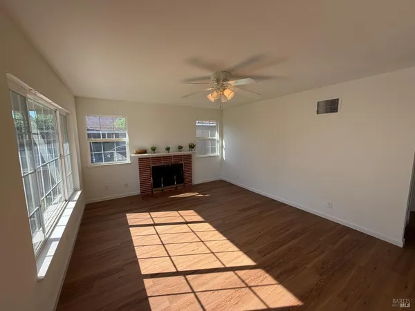 a view of a livingroom with a fireplace