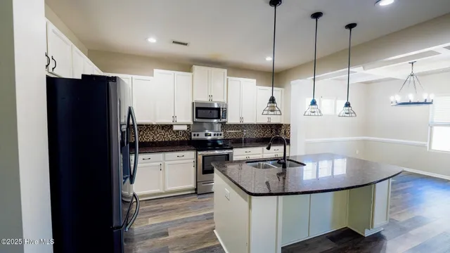 $500,000 | 402 Ponzer Court North, Holly Ridge, NC 28445