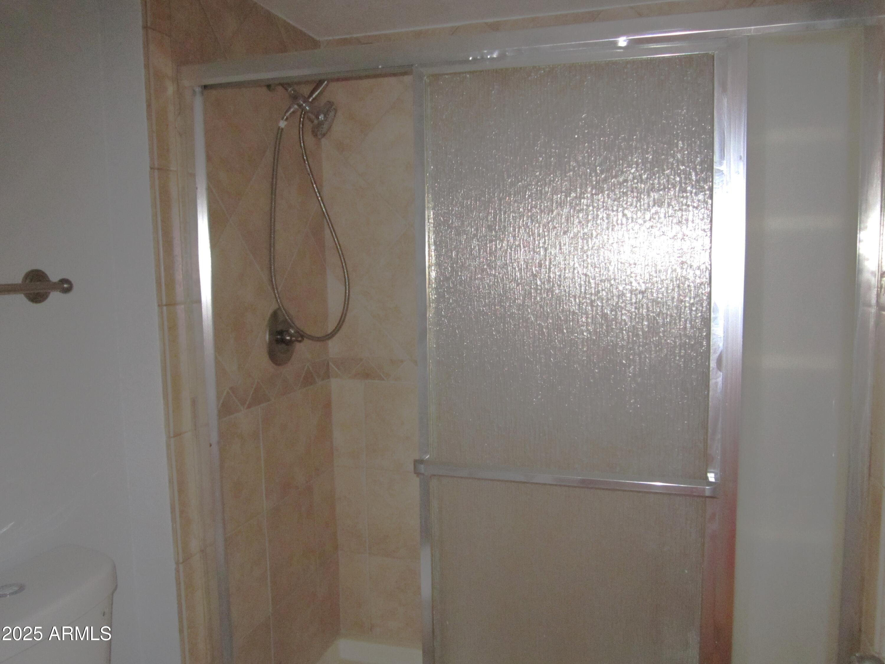 4303 East Cactus Road, Unit 331 Phoenix, AZ 85032 - Photo 14 of 34 9-331 PRIMARY SHOWER