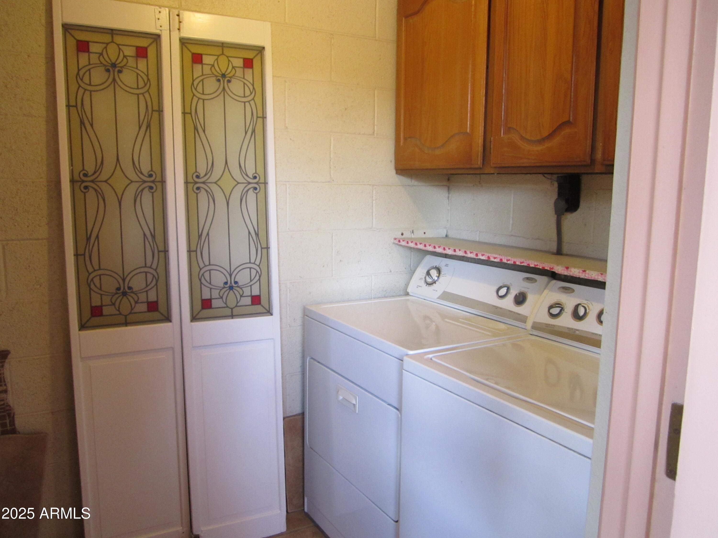 4303 East Cactus Road, Unit 331 Phoenix, AZ 85032 - Photo 16 of 34 9-331 LAUNDRY & STORAGE