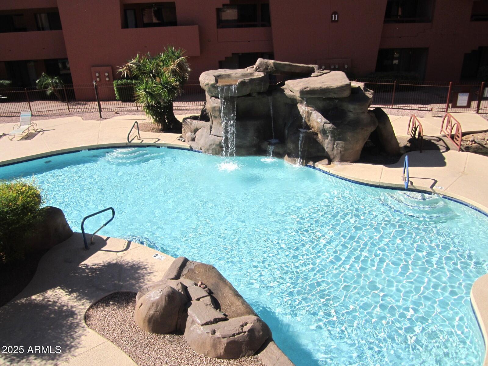 4303 East Cactus Road, Unit 331 Phoenix, AZ 85032 - Photo 24 of 34 ANASAZI 1123 MAIN POOL WATERFALL