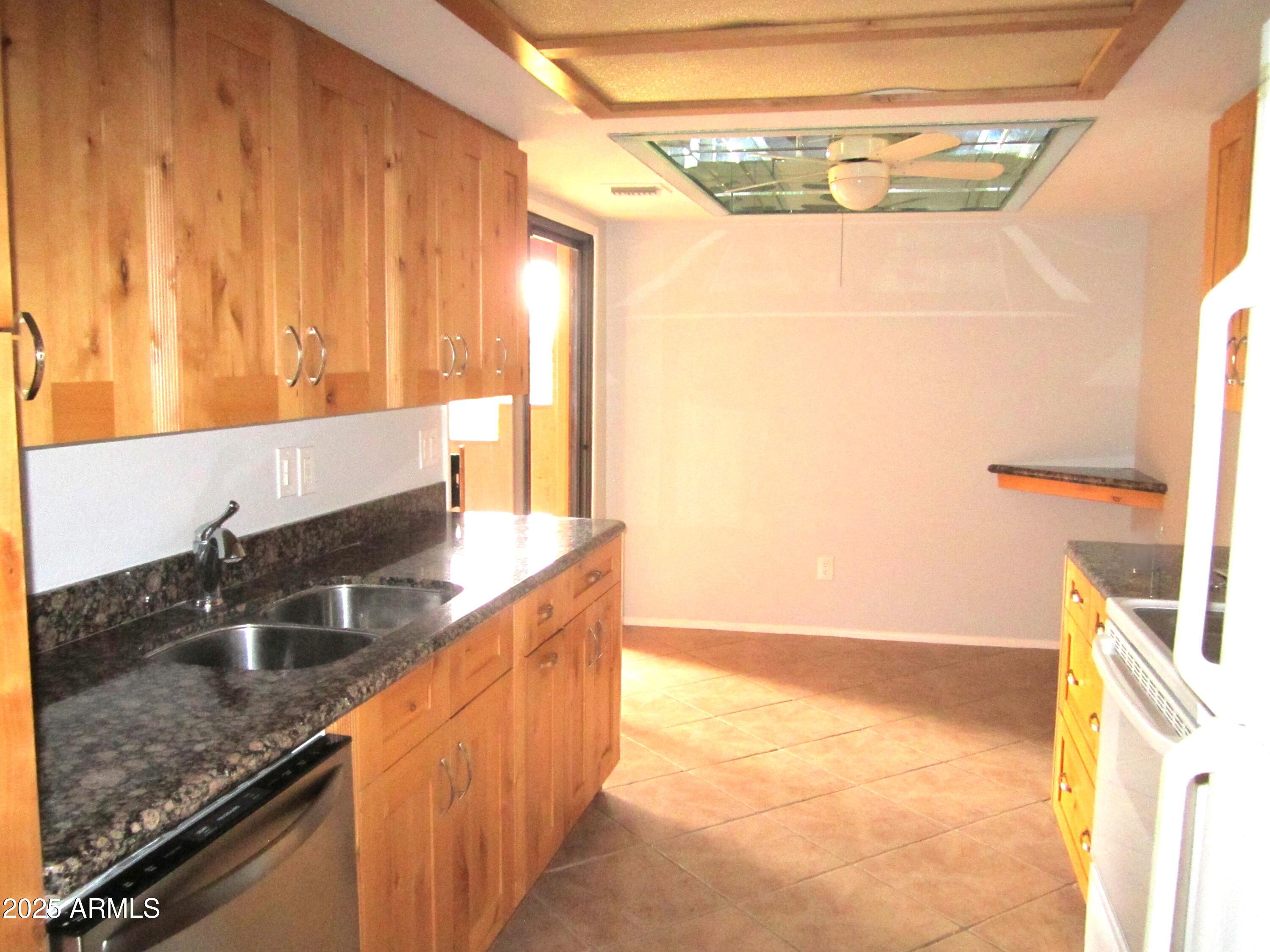 4303 East Cactus Road, Unit 331 Phoenix, AZ 85032 - Photo 7 of 34 9-331 KITCHEN B