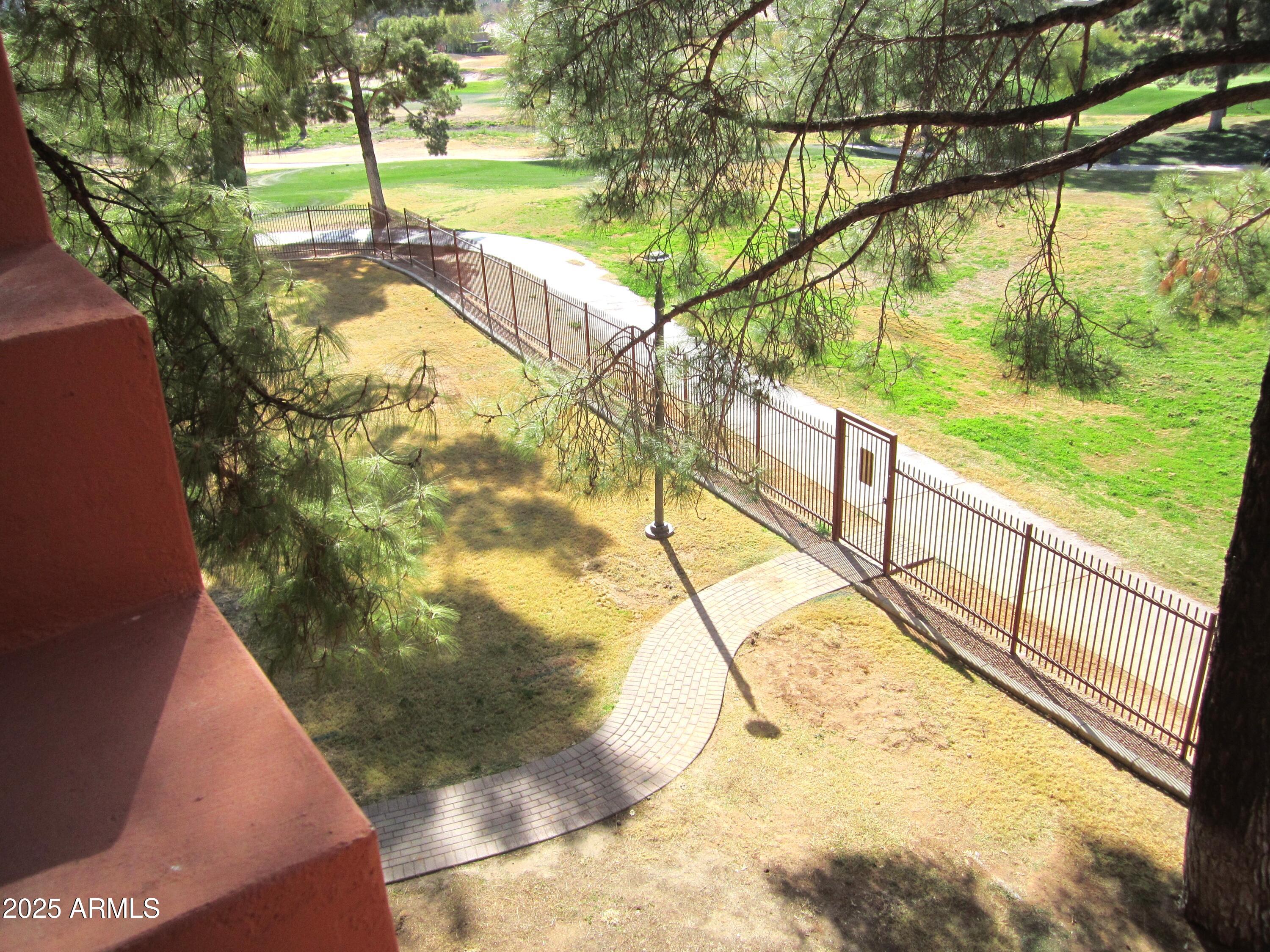 4303 East Cactus Road, Unit 331 Phoenix, AZ 85032 - Photo 8 of 34 9-331 LOOKING DOWN FROM BALCONY