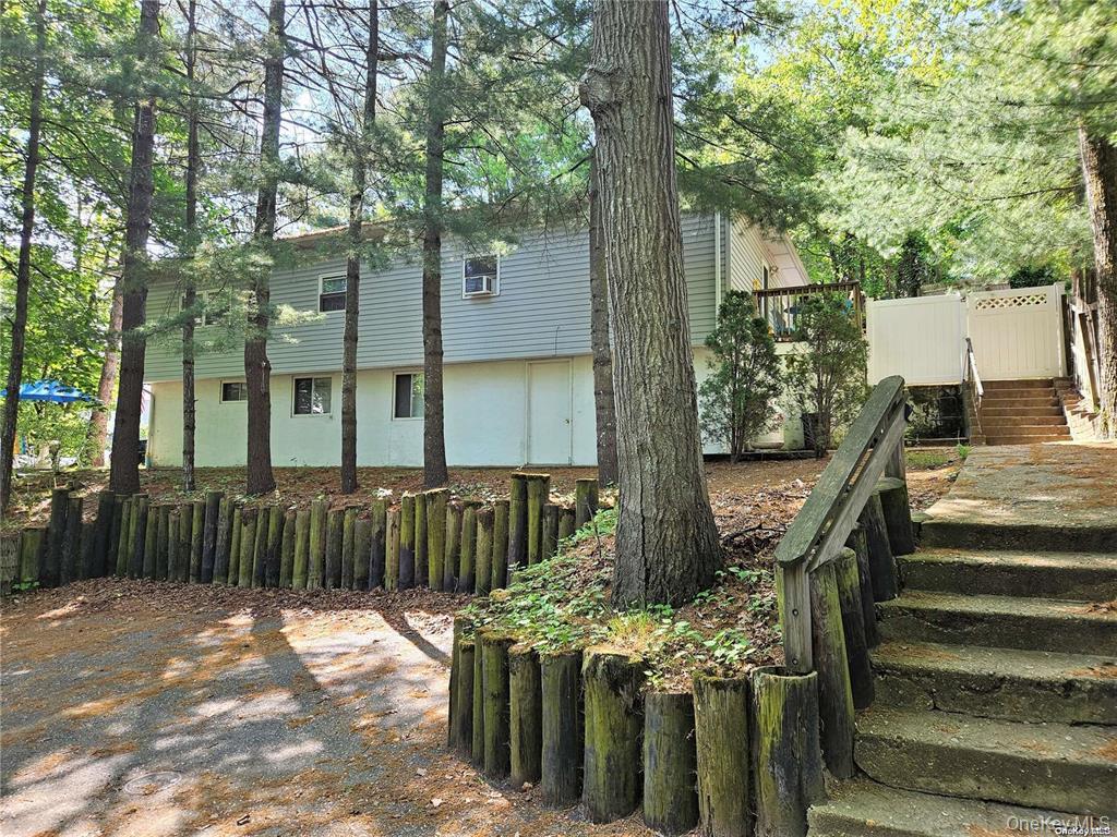 a view of outdoor space with deck and furniture