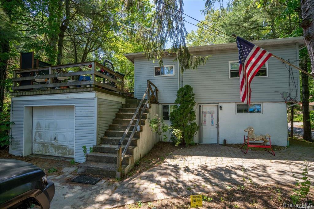 57 Aloma Road Rocky Point, NY 11778 - Photo 2 of 5 a view of a house with a yard