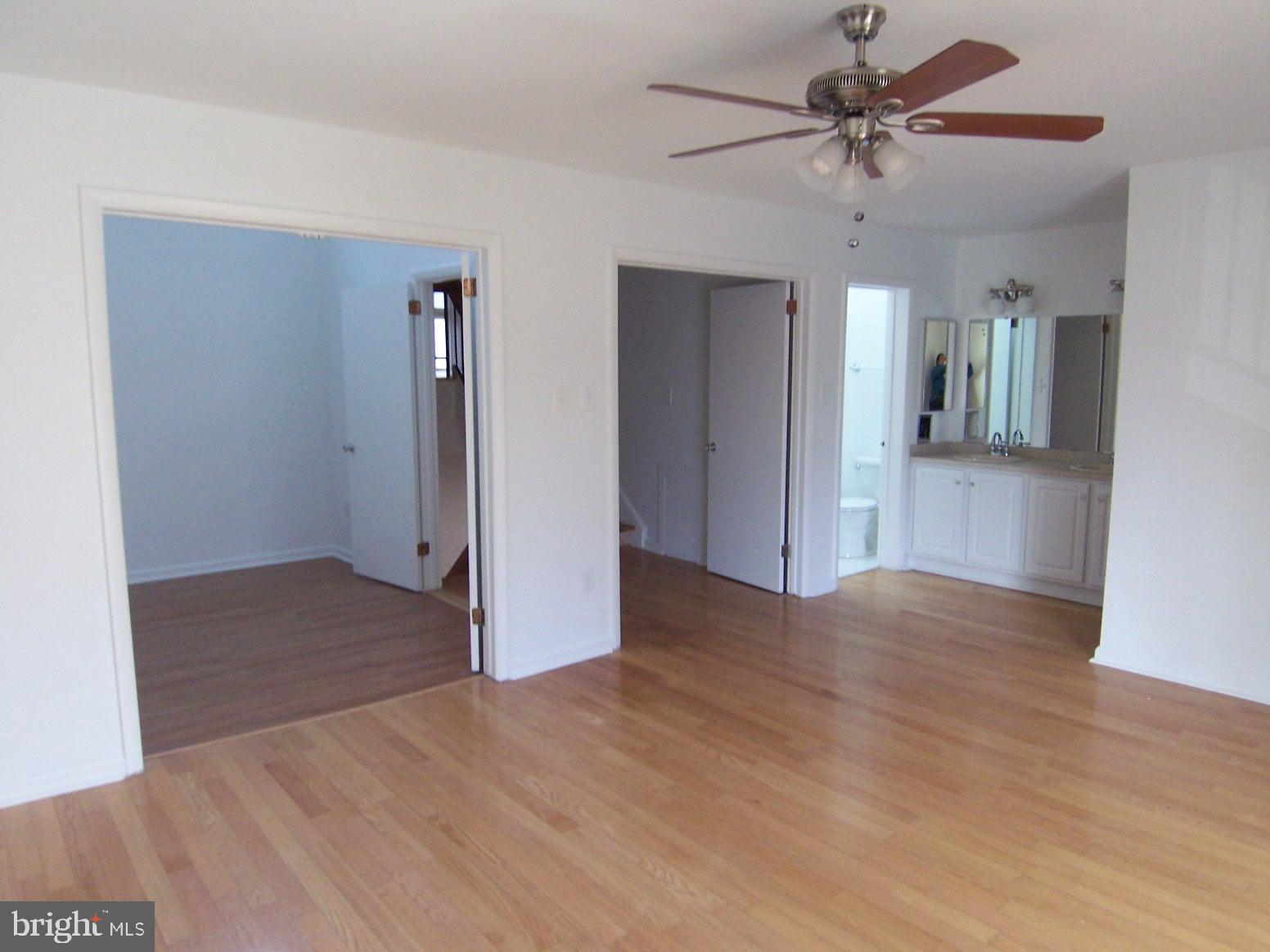 11677 Newbridge Court Reston, VA 20191 - Photo 11 of 23 MASTER BEDROOM,DEN,ENTRANCE TO MASTER BATH