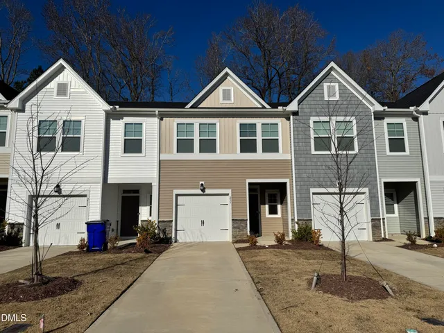 a front view of house with a yard