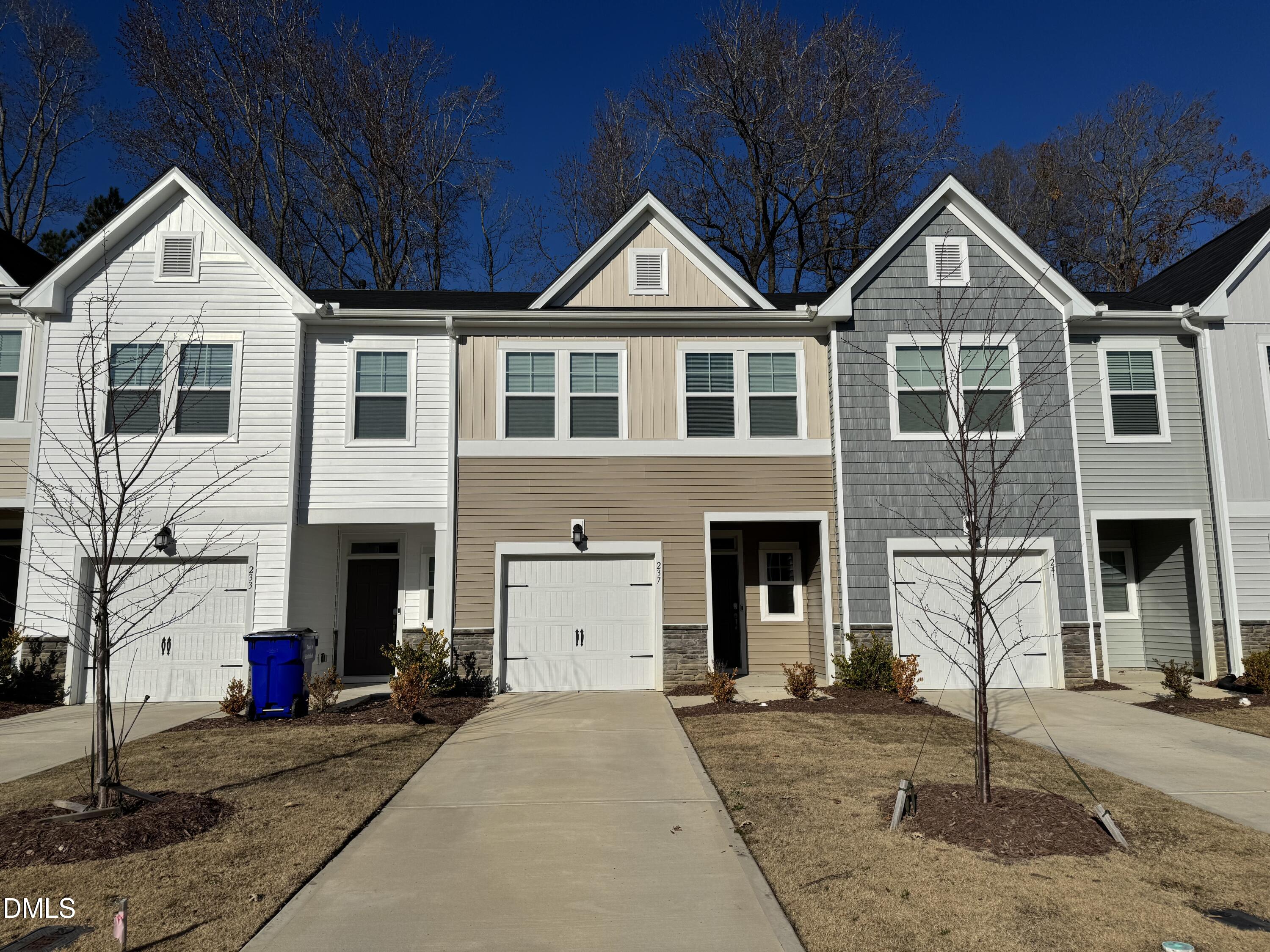 a front view of house with a yard
