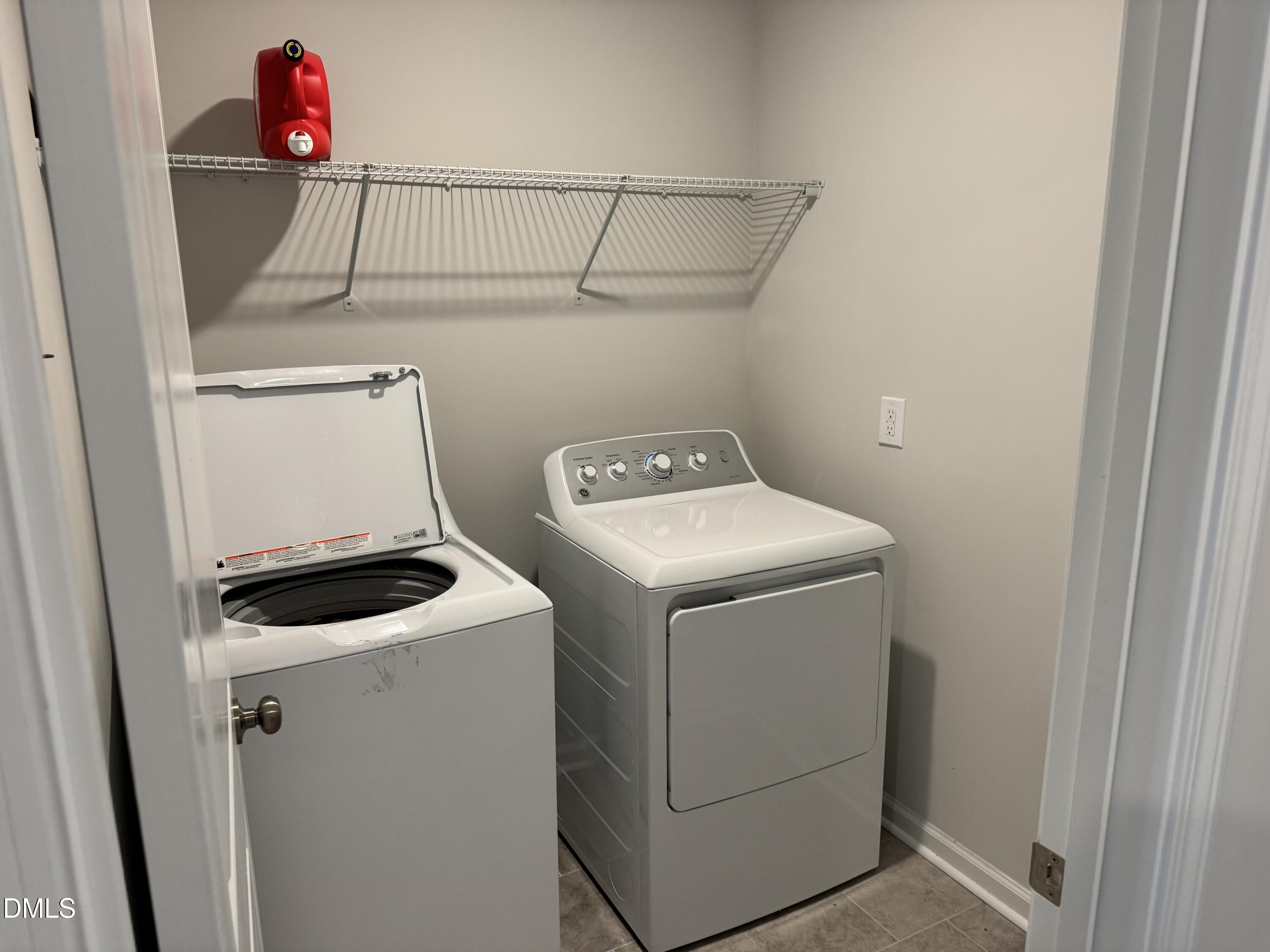 237 Peebles Drive Smithfield, NC 27577 - Photo 11 of 21 a utility room with dryer and washer