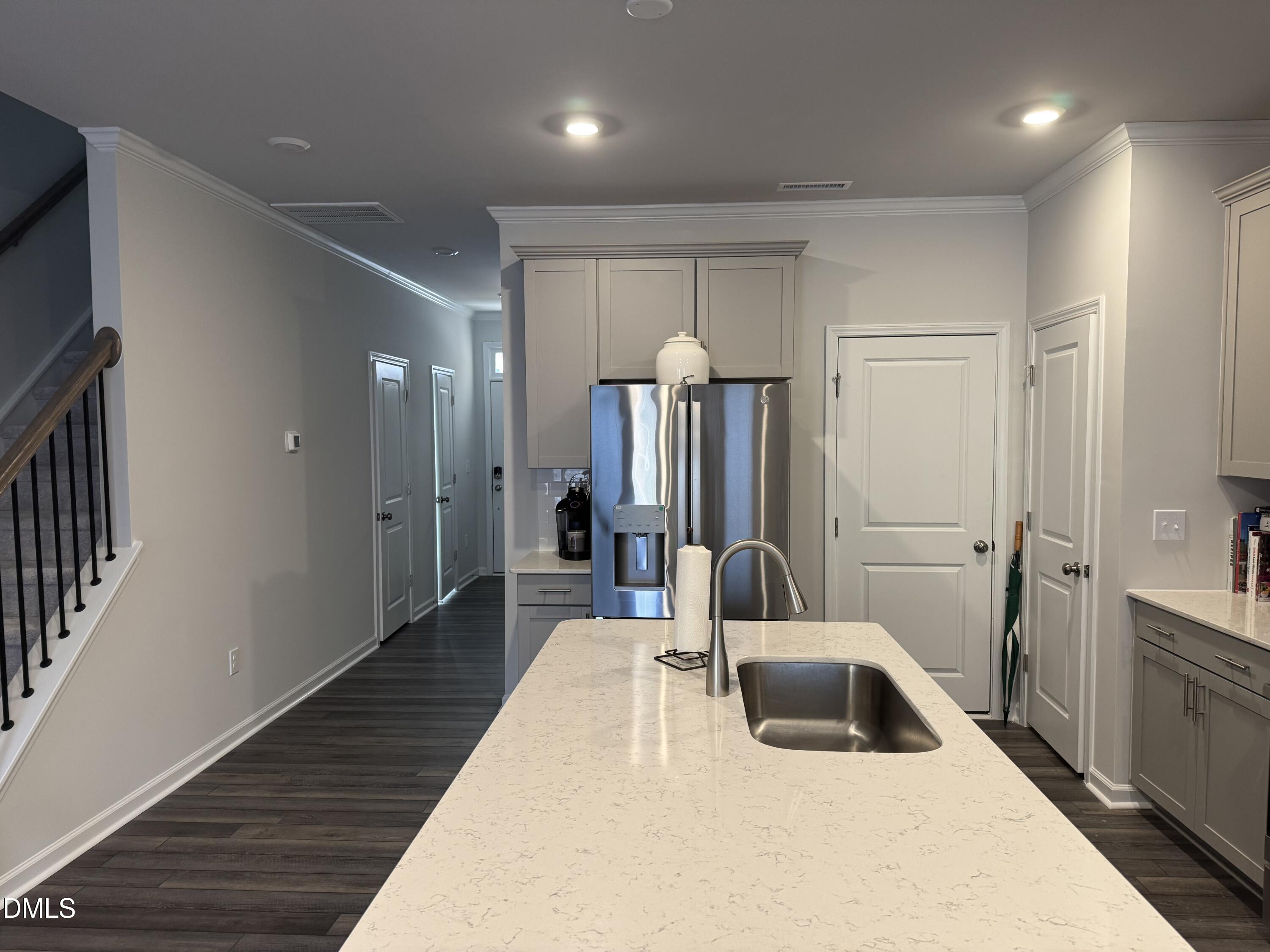 237 Peebles Drive Smithfield, NC 27577 - Photo 3 of 21 a bedroom with a bed and a large mirror