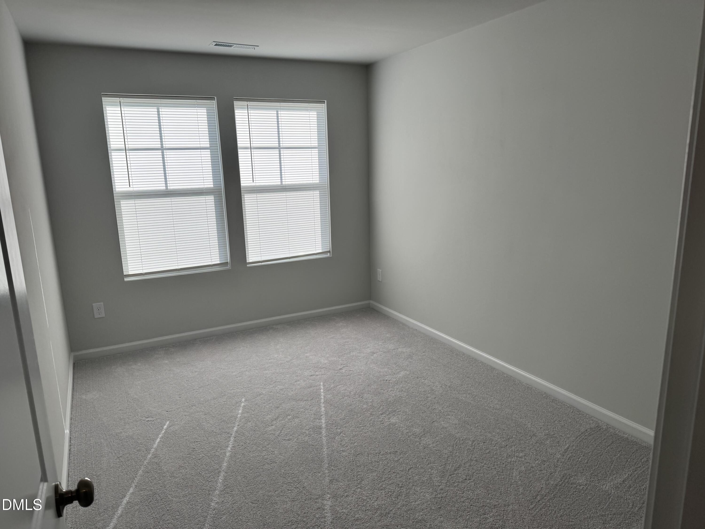 237 Peebles Drive Smithfield, NC 27577 - Photo 9 of 21 an empty room with a window