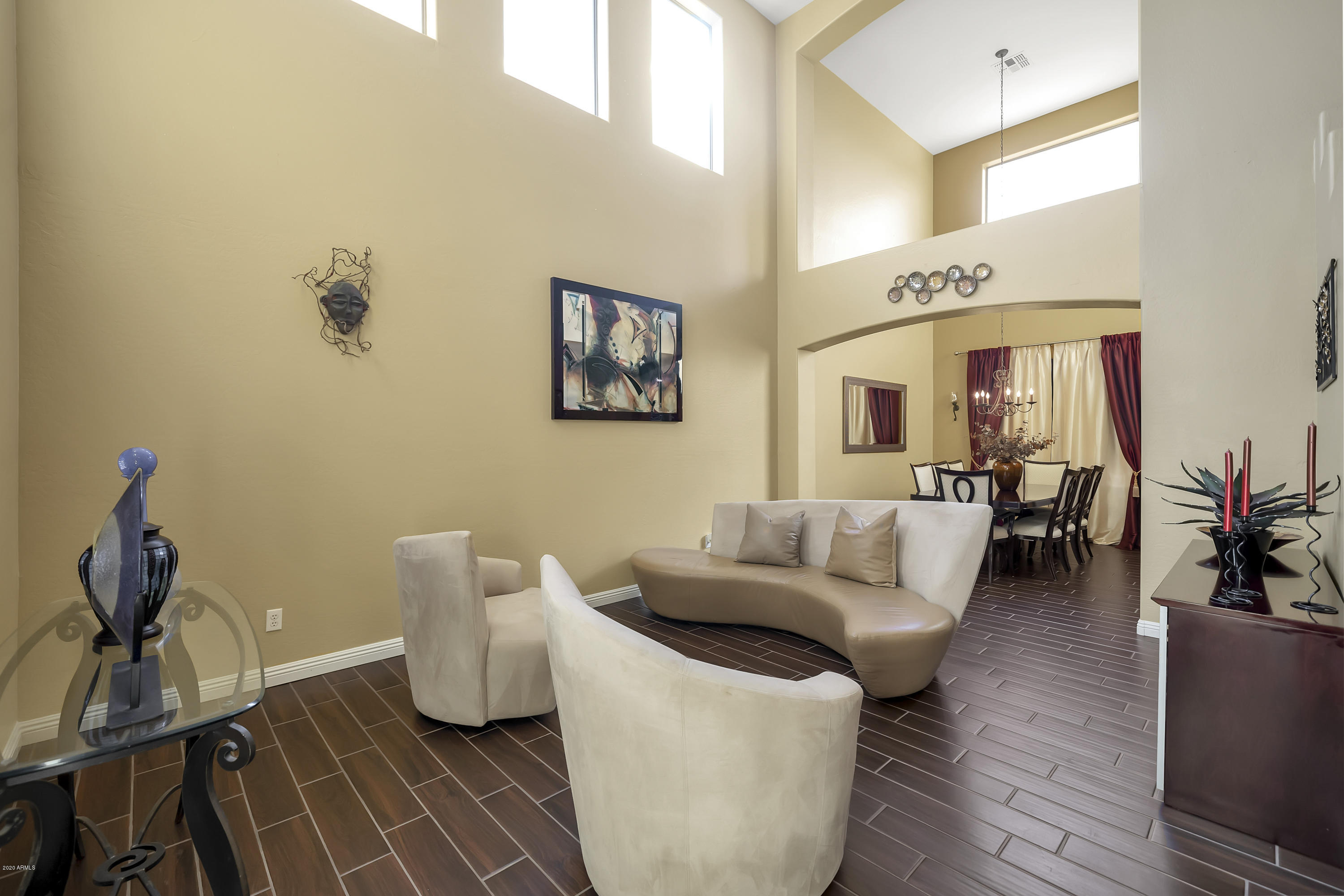 14103 West Bloomfield Road Surprise, AZ 85379 - Photo 4 of 51 a living room with furniture and wooden floor