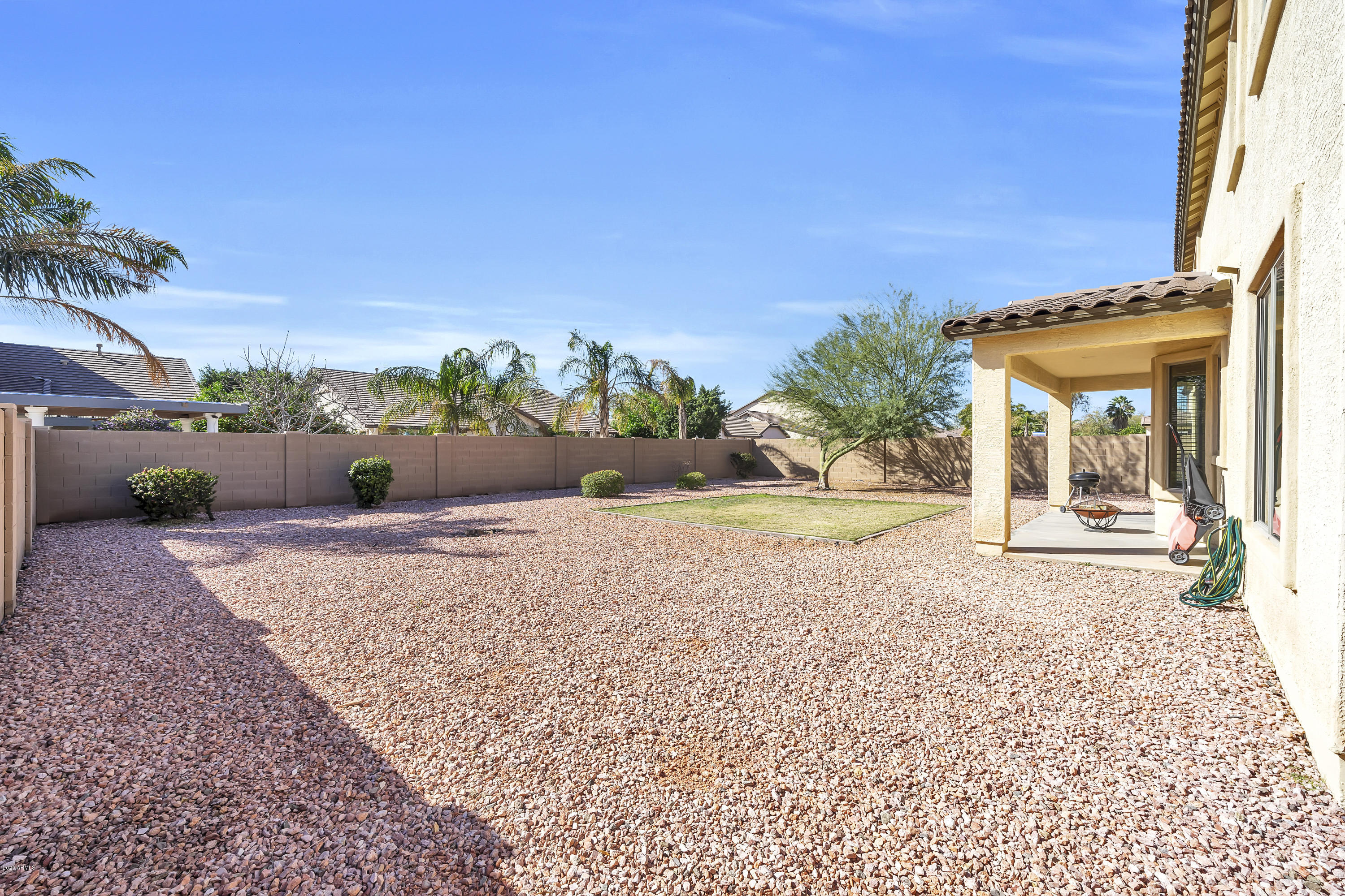 14103 West Bloomfield Road Surprise, AZ 85379 - Photo 42 of 51 a view of a house with a patio