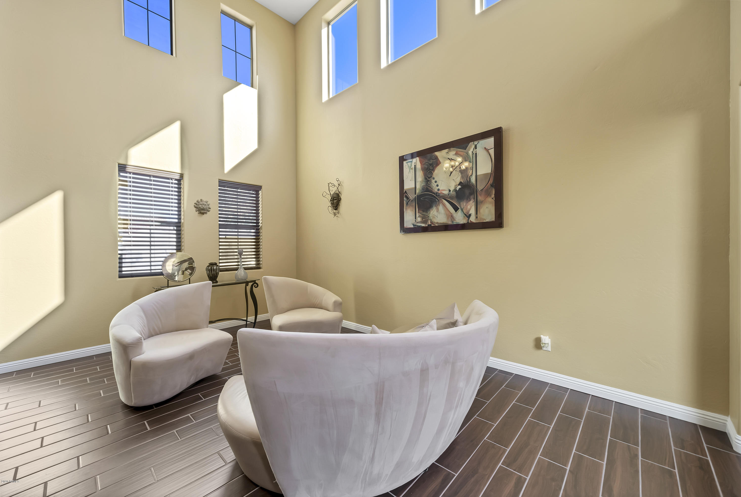 14103 West Bloomfield Road Surprise, AZ 85379 - Photo 7 of 51 a living room with furniture and a window