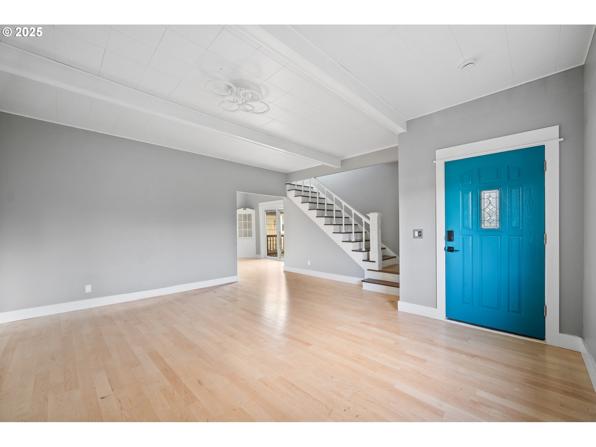 12533 Southeast Sunnyside Road Clackamas, OR 97015 - Photo 19 of 29 a view of an empty room with wooden floor