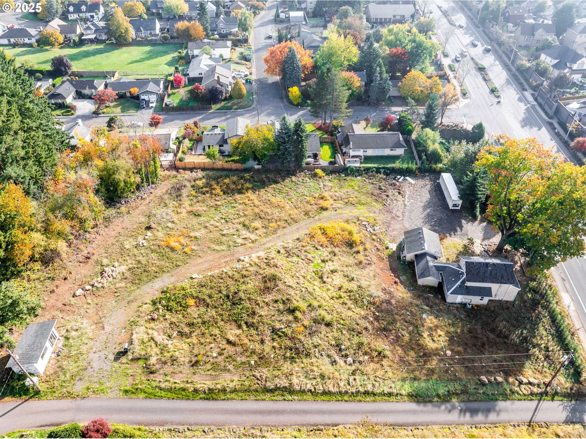 12533 Southeast Sunnyside Road Clackamas, OR 97015 - Photo 8 of 29 a front view of a house with garden space and sitting area