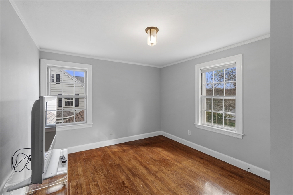 26 Pickwick Road Marblehead, MA 01945 - Photo 28 of 40 a view of a livingroom with wooden floor and a window
