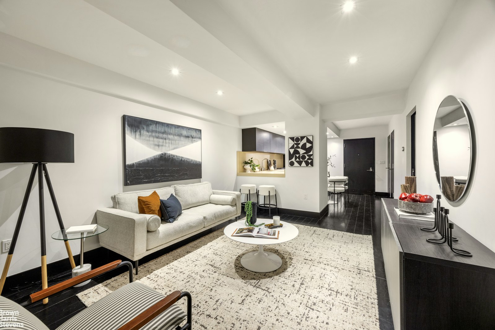 254 Park Avenue South, Unit GARDEN Manhattan, NY 10010 - Photo 3 of 18 a living room with furniture and a flat screen tv