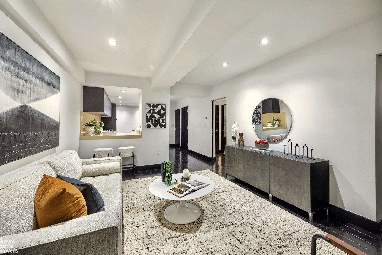 254 Park Avenue South, Unit GARDEN Manhattan, NY 10010 - Photo 4 of 18 a living room with furniture and wooden floor