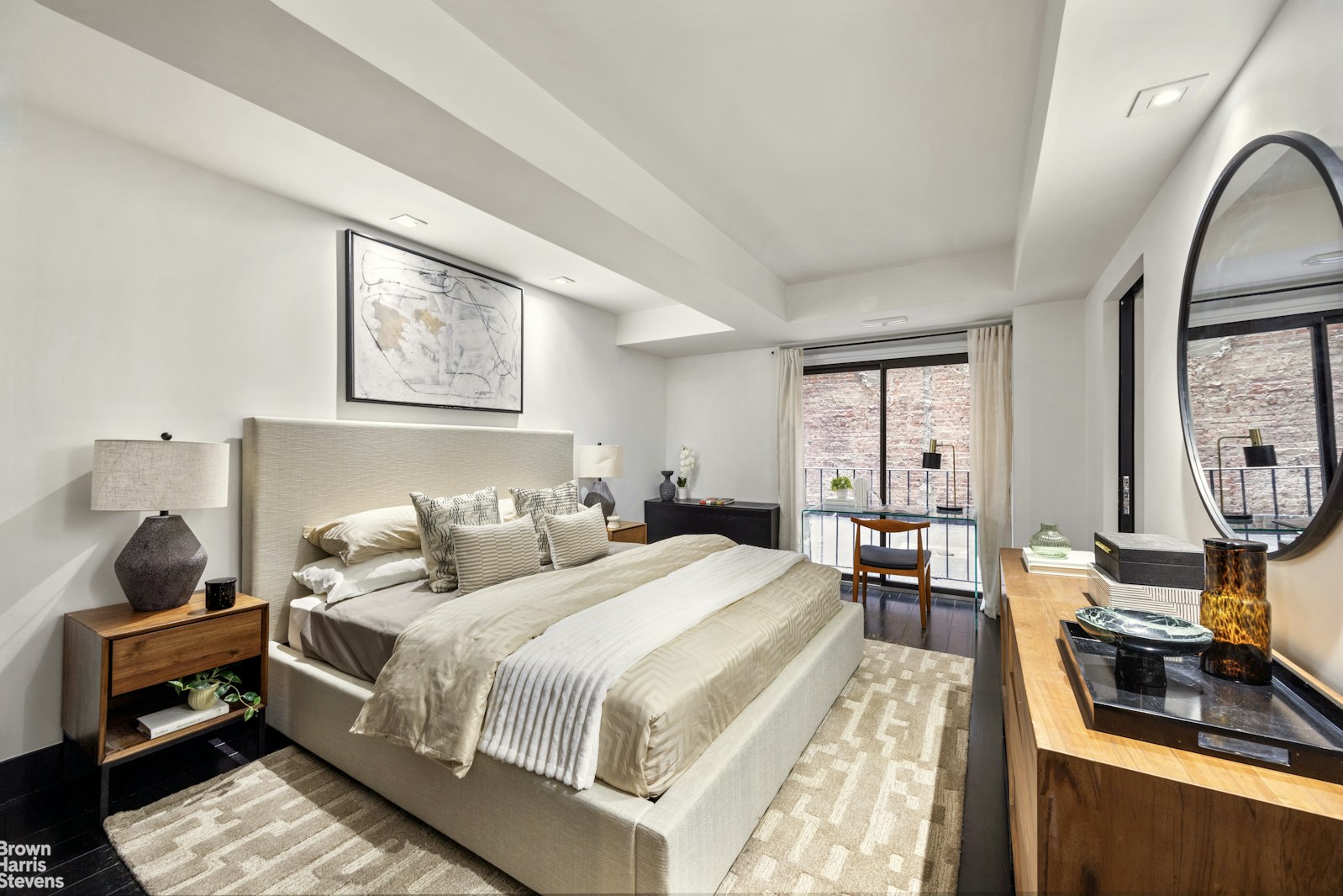 254 Park Avenue South, Unit GARDEN Manhattan, NY 10010 - Photo 6 of 18 a bedroom with a bed and wooden floor