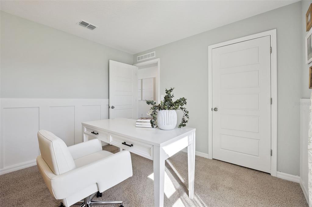 3417 Nettle Loop Tavares, FL 32778 - Photo 21 of 29 a workspace with furniture and window