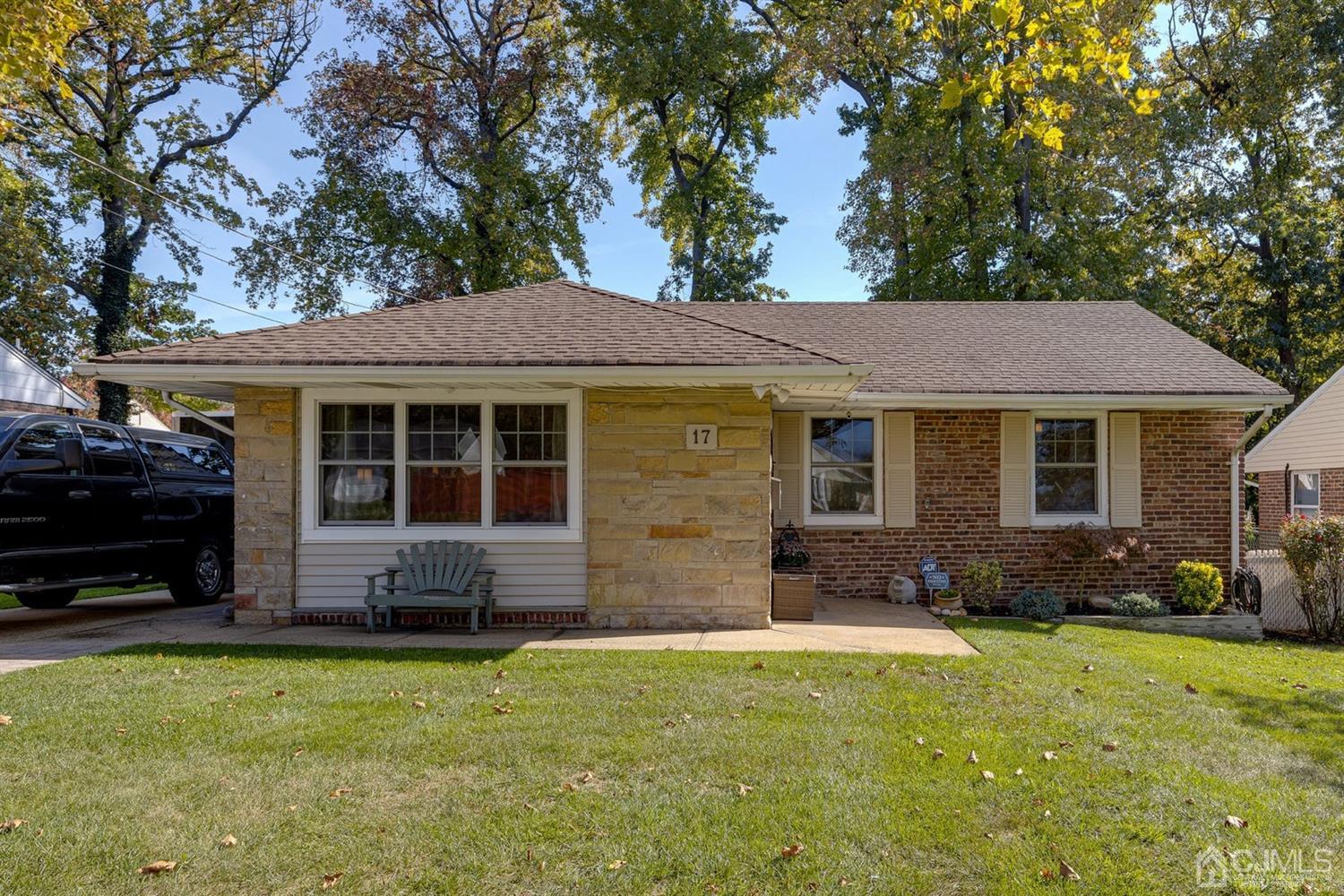 17 Melville Road Edison, NJ 08817 - Photo 1 of 26 a front view of a house with a yard