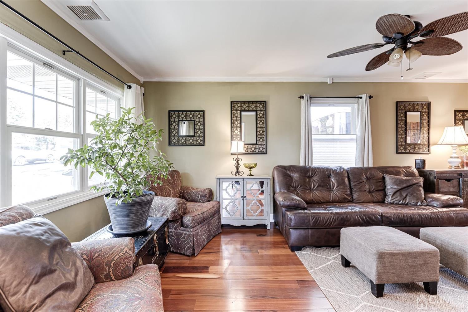17 Melville Road Edison, NJ 08817 - Photo 7 of 26 a living room with furniture or window and a potted plant