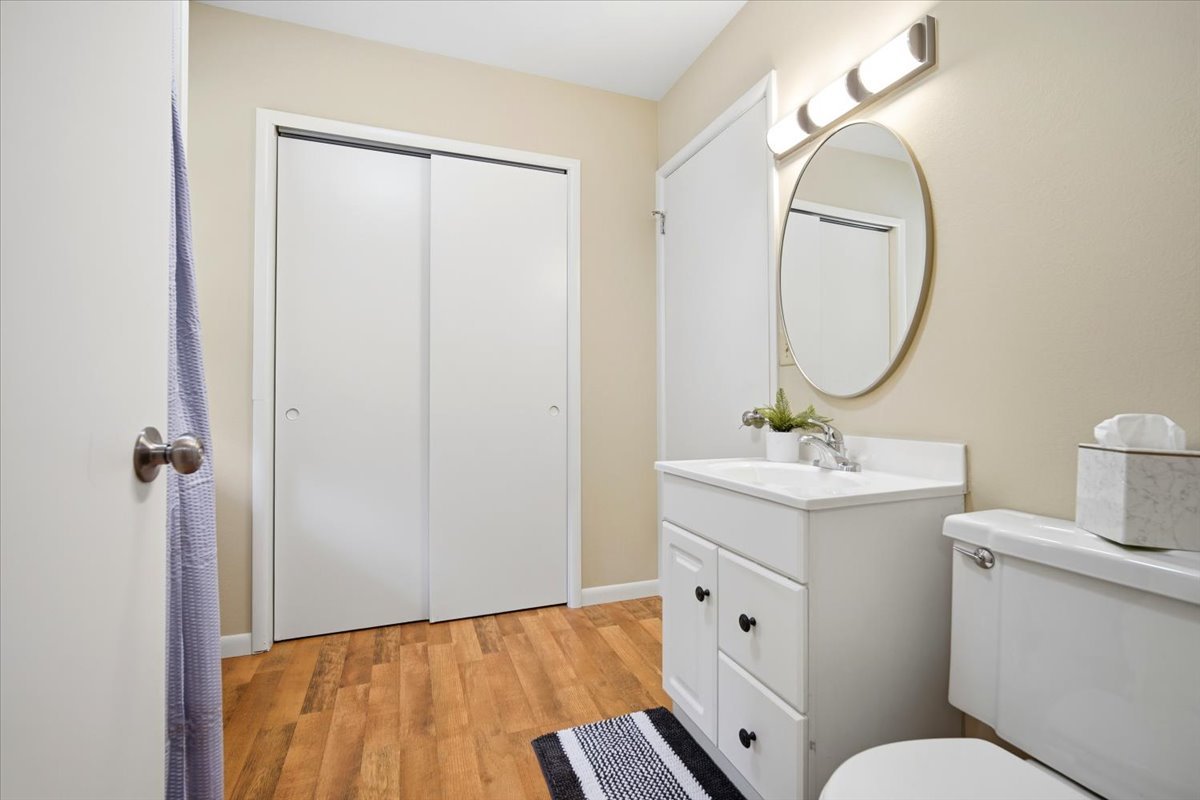 203 Highview Drive Eureka, IL 61530 - Photo 24 of 49 a bathroom with a toilet a sink and a mirror
