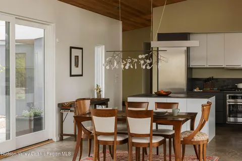 a view of a dining room with furniture