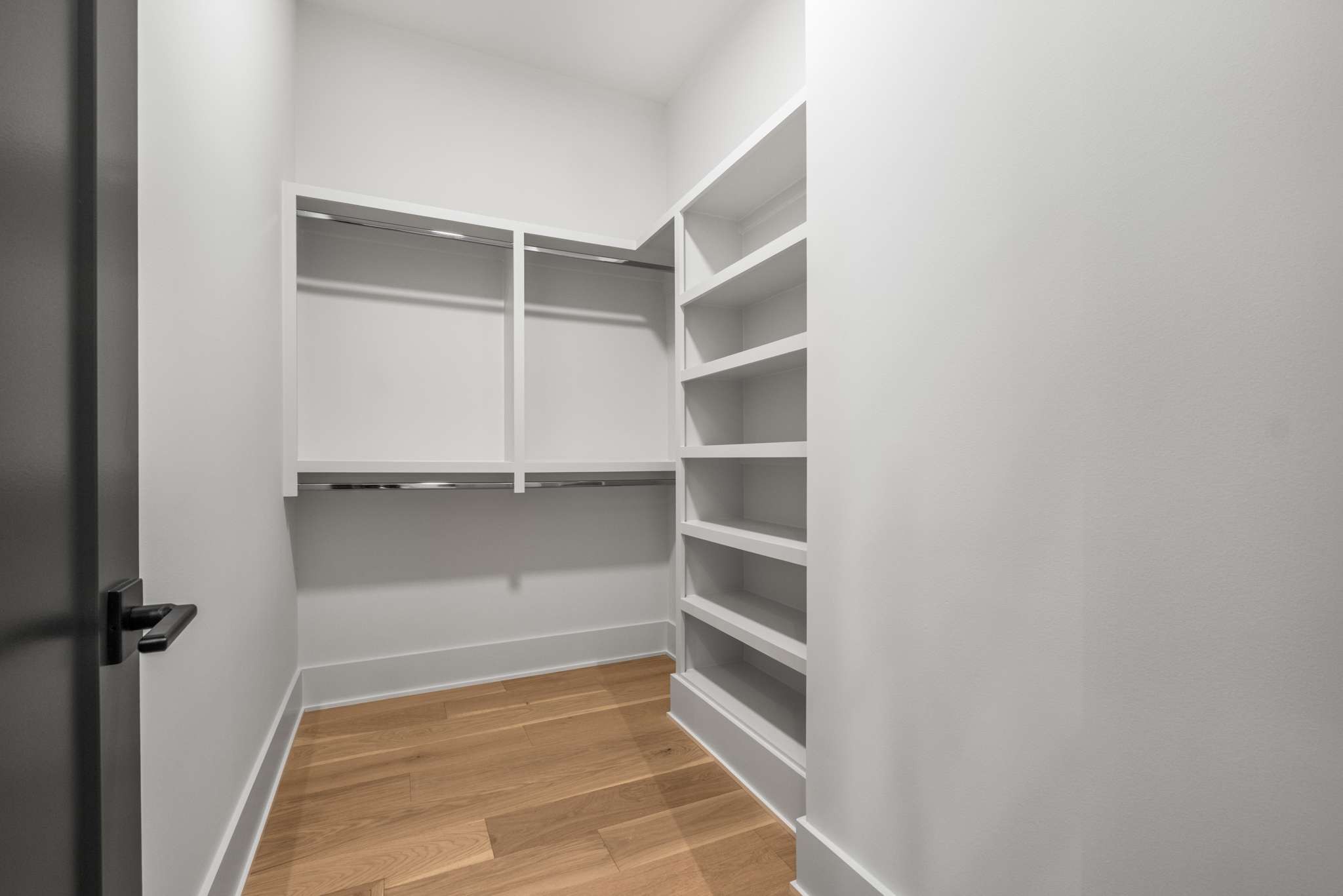 4530 Everett Drive Nashville, TN 37215 - Photo 56 of 89 a view of walk in closet with empty racks